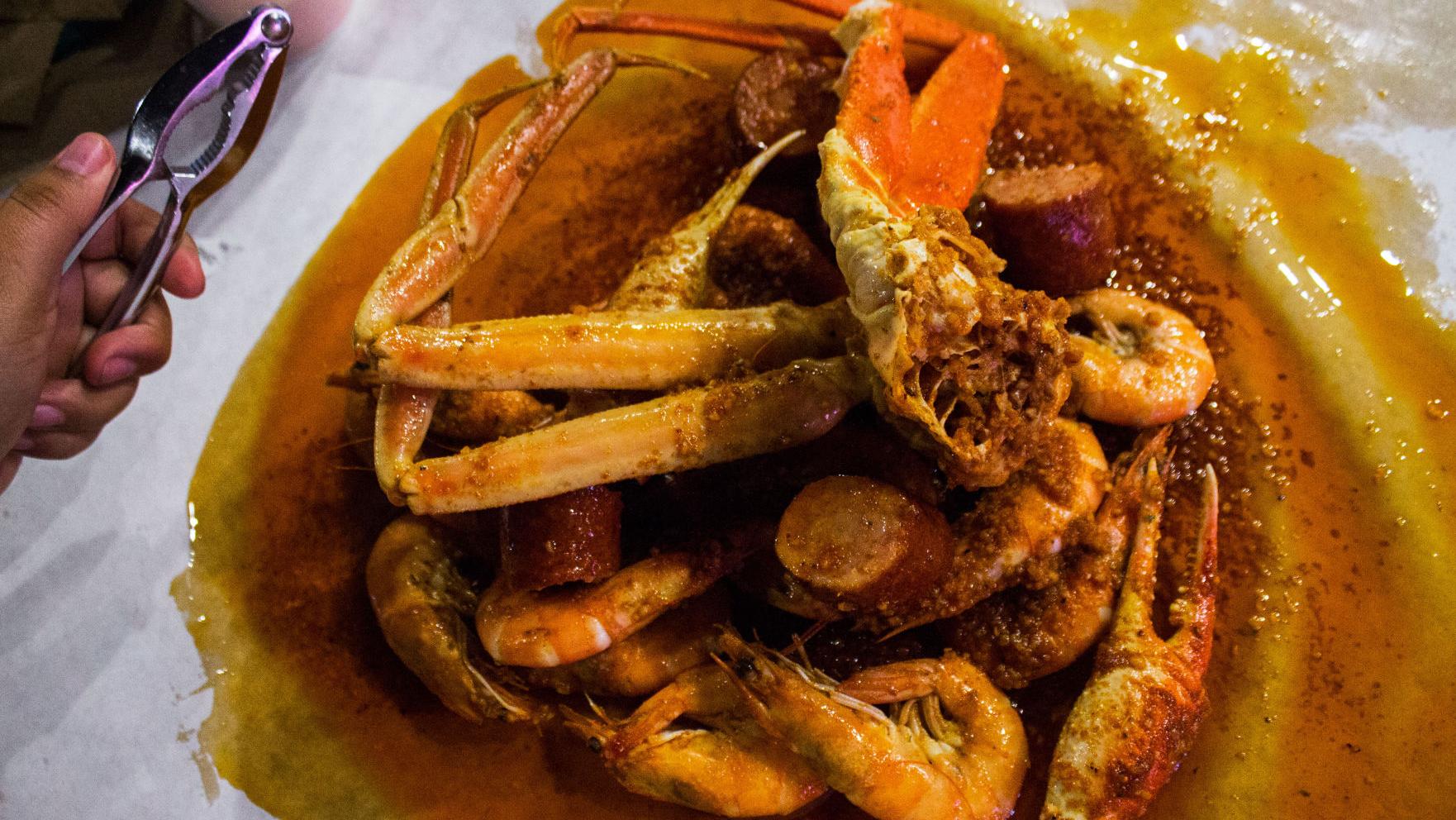 Slap on your bib and get to Angry Crab. It's open!